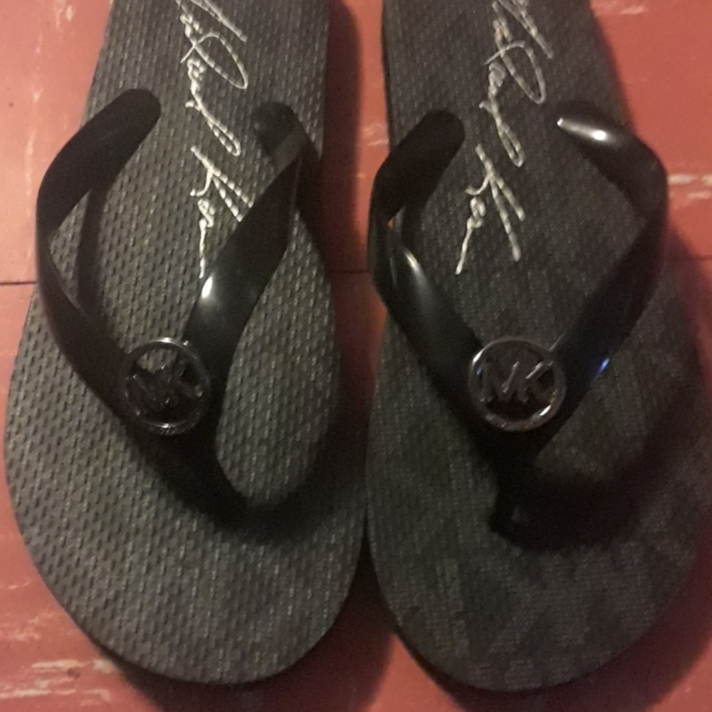 New Michael kors black flip flops